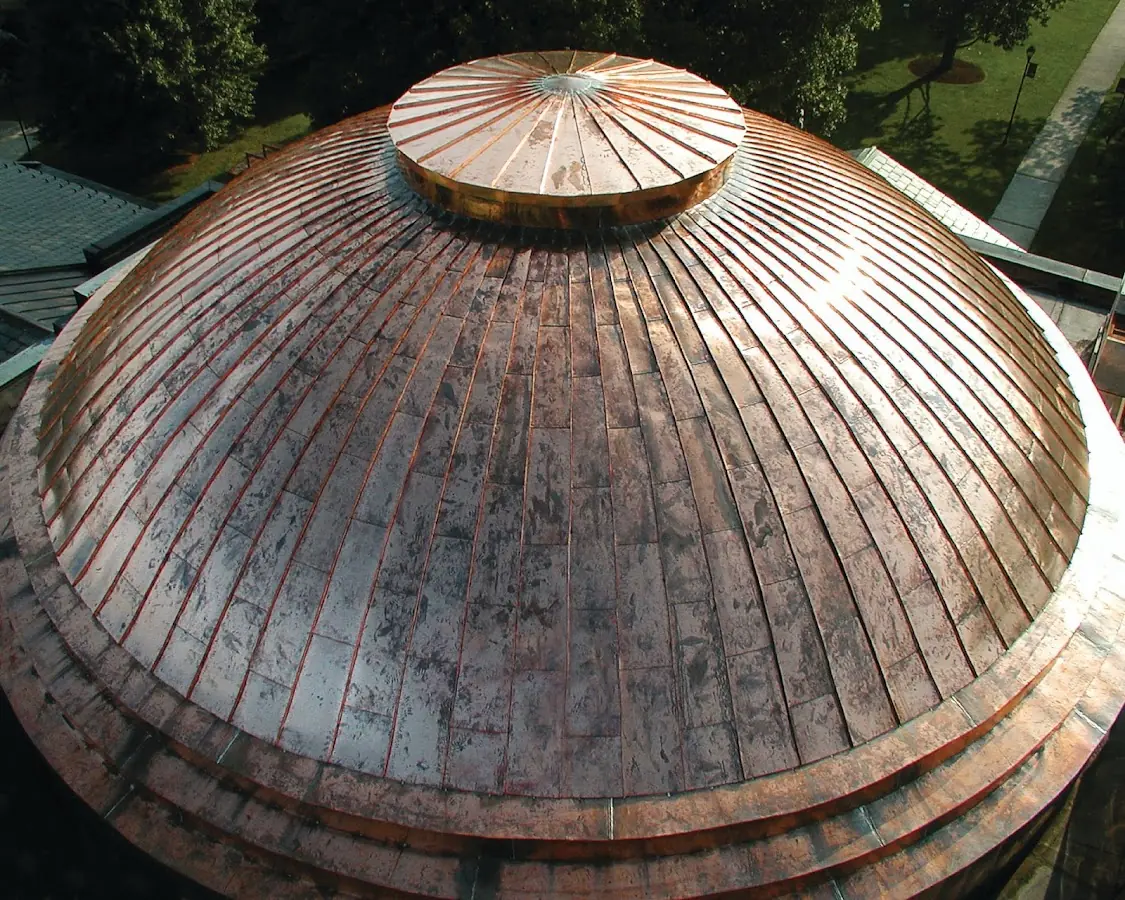 Craftsman Roofing crew installing a new roof in Bloomfield